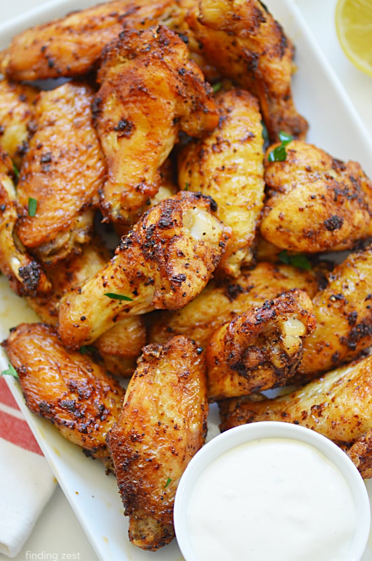 Air Fryer Lemon Pepper Wings are amazing and crispy. This chicken wings in the air fryer recipe is so good and easy! These wings are not spicy but loaded with flavor.