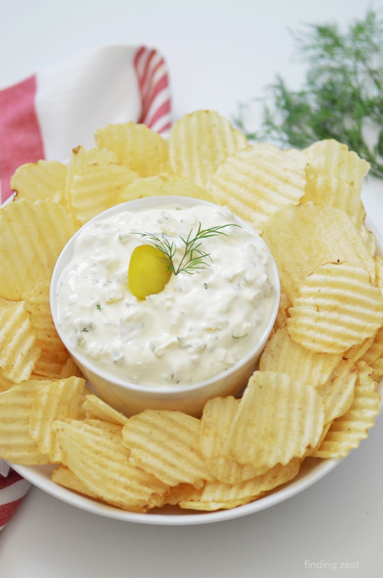 If you love pickles, you'll love this dill pickle dip recipe with cream cheese and sour cream. This easy dip works great paired with potato chips or your favorite crackers.