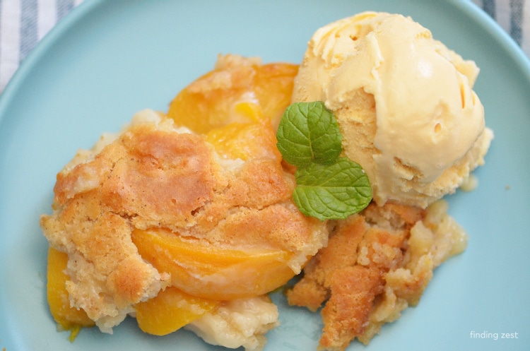 Enjoy peach cobbler anytime with this easy peach cobbler recipe using canned peaches! Serve it up with some vanilla ice cream for a killer combination.