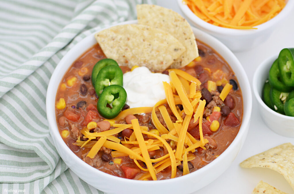 Beef taco soup recipe that is a delicious and easy one pot meal! Top with your favorite taco toppings.