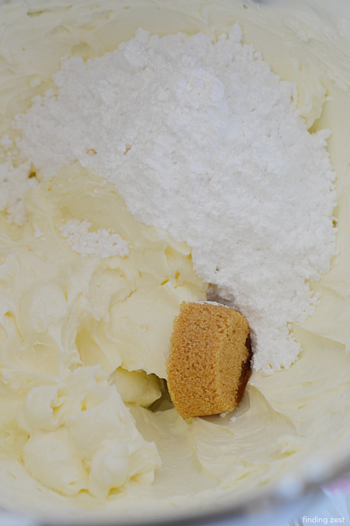Adding Powdered sugar brown sugar and vanilla to dessert dip