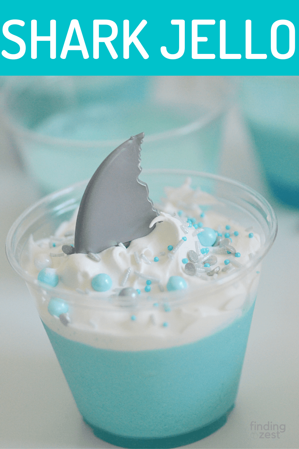 Throw your child a shark-themed birthday party that is sure to make a splash! These shark jello cups with sprinkles are the perfect addition to any shark party. And don't forget the shark fin toppers! They're sure to be a hit with kids of all ages.