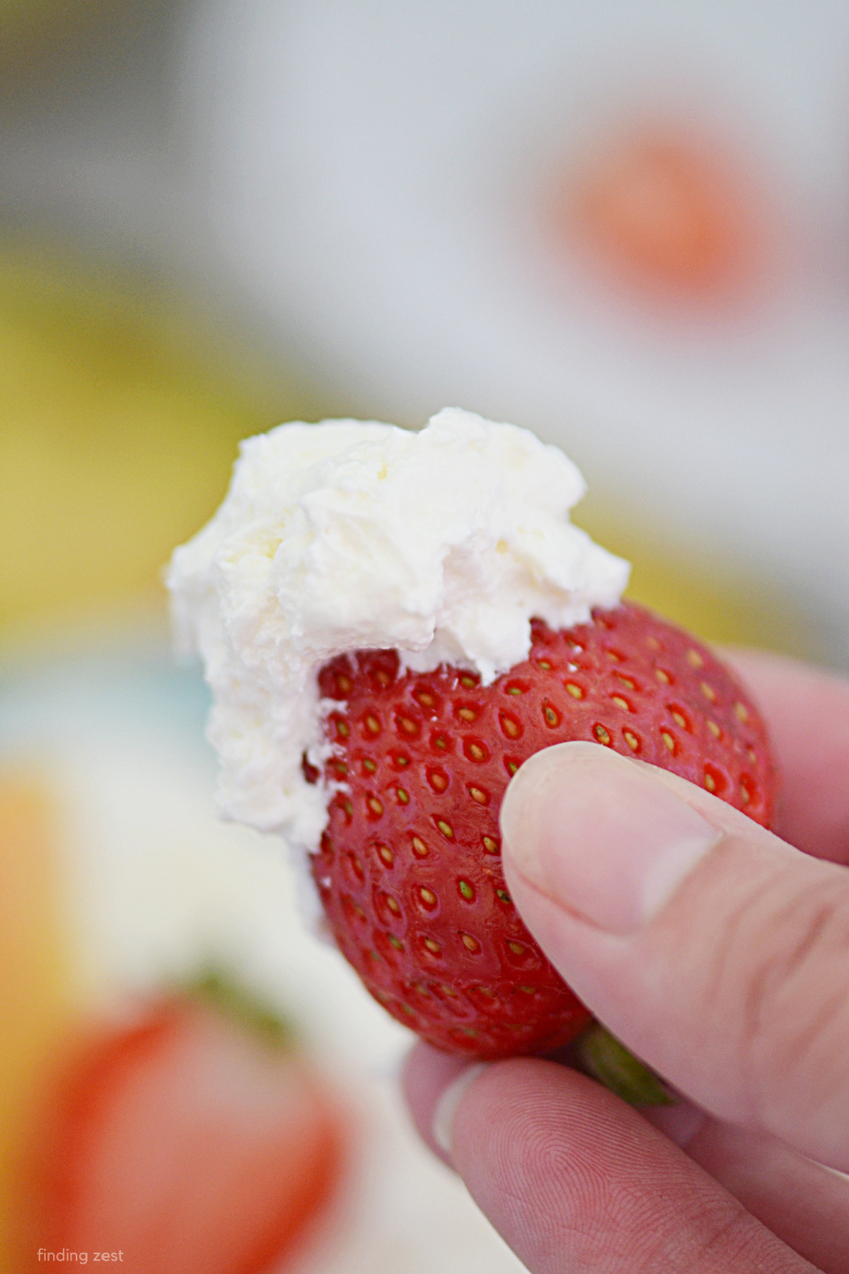 You're going to love this easy fruit dip recipe that requires no marshmallow cream. It's fluffy, creamy, and the perfect sweet treat for your next holiday party or gathering..