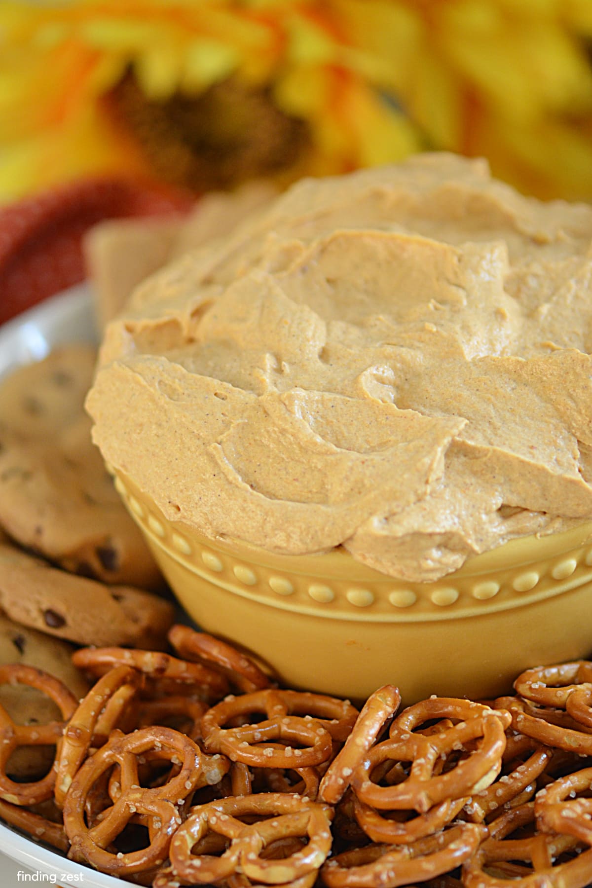 This pumpkin fluff recipe is so easy, no-bake, and perfect for fall snacking! All you need are five ingredients including canned pumpkin, pudding and COOL WHIP! This pumpkin dessert dip is great for parties or game day snacks!