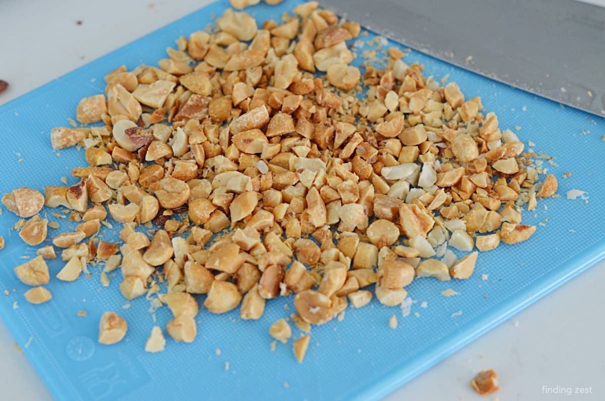 Chopped peanuts on a cutting board
