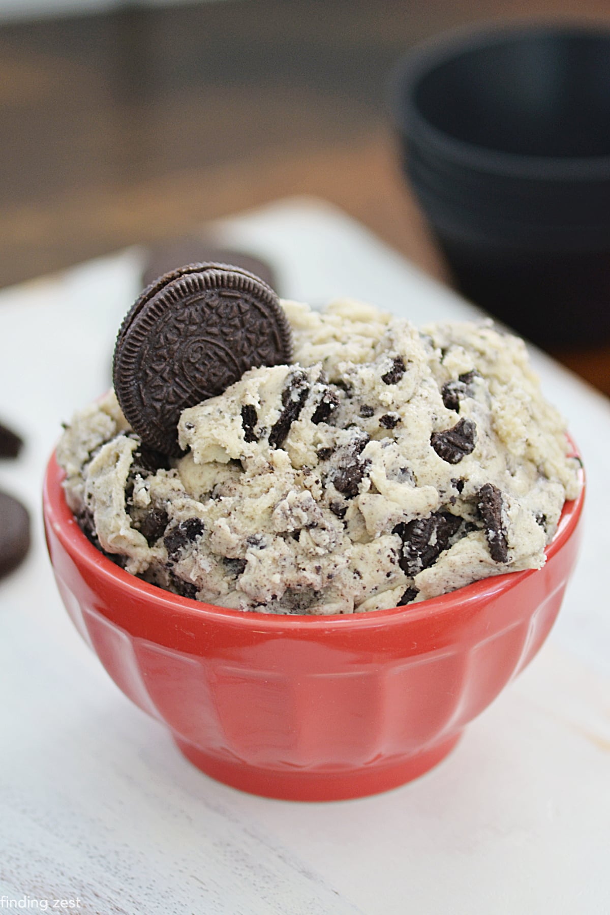 Oreo cookie dough never tasted so good! This edible cookie dough recipe is safe to eat raw and tastes amazing. Skip the baking, grab a spoon and dig in!