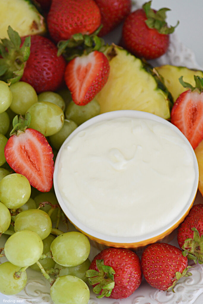 This cream cheese marshmallow fruit dip is so creamy and delicious, everyone will be going back for seconds! Easy to make with just four ingredients