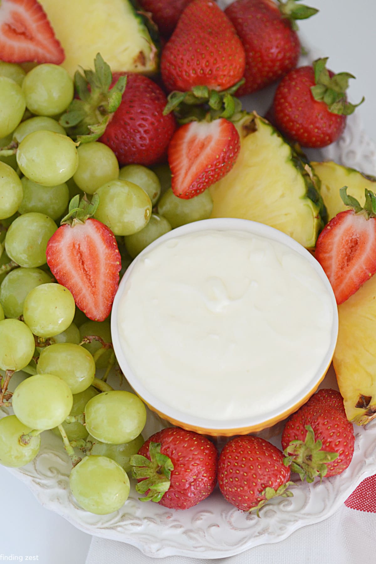 Marshmallow fruit dip requires just four simple ingredients and tastes amazing with your favorite fresh fruits! This fruit dip is perfect for any occasion, whether you're entertaining, preparing lunches, or indulging in a snack.