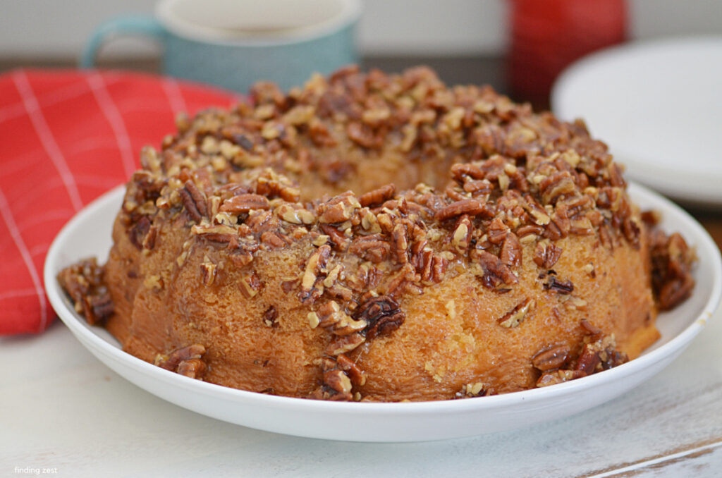 Pecan upside-down bundt cake that is so moist and delicious! Everyone will want a second piece!