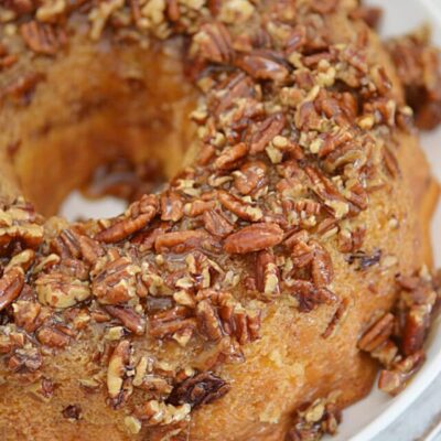 This pecan upside down cake is a crowd-pleasing dessert that is bound to be a hit with everyone! A sweet, sticky, and tempting pecan topping completes this recipe for a moist and flavorful cake.