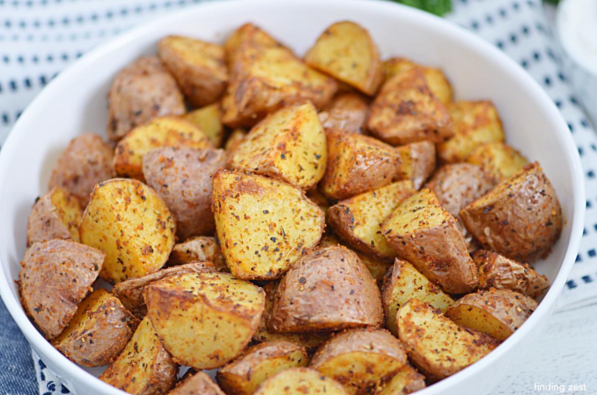 Cooking red potatoes in an air fryer is a breeze. These roasted potatoes are so easy to make in an air fryer, and they make a great side dish. These oven-free crispy potatoes are perfect with any meat, fish, or poultry dish.