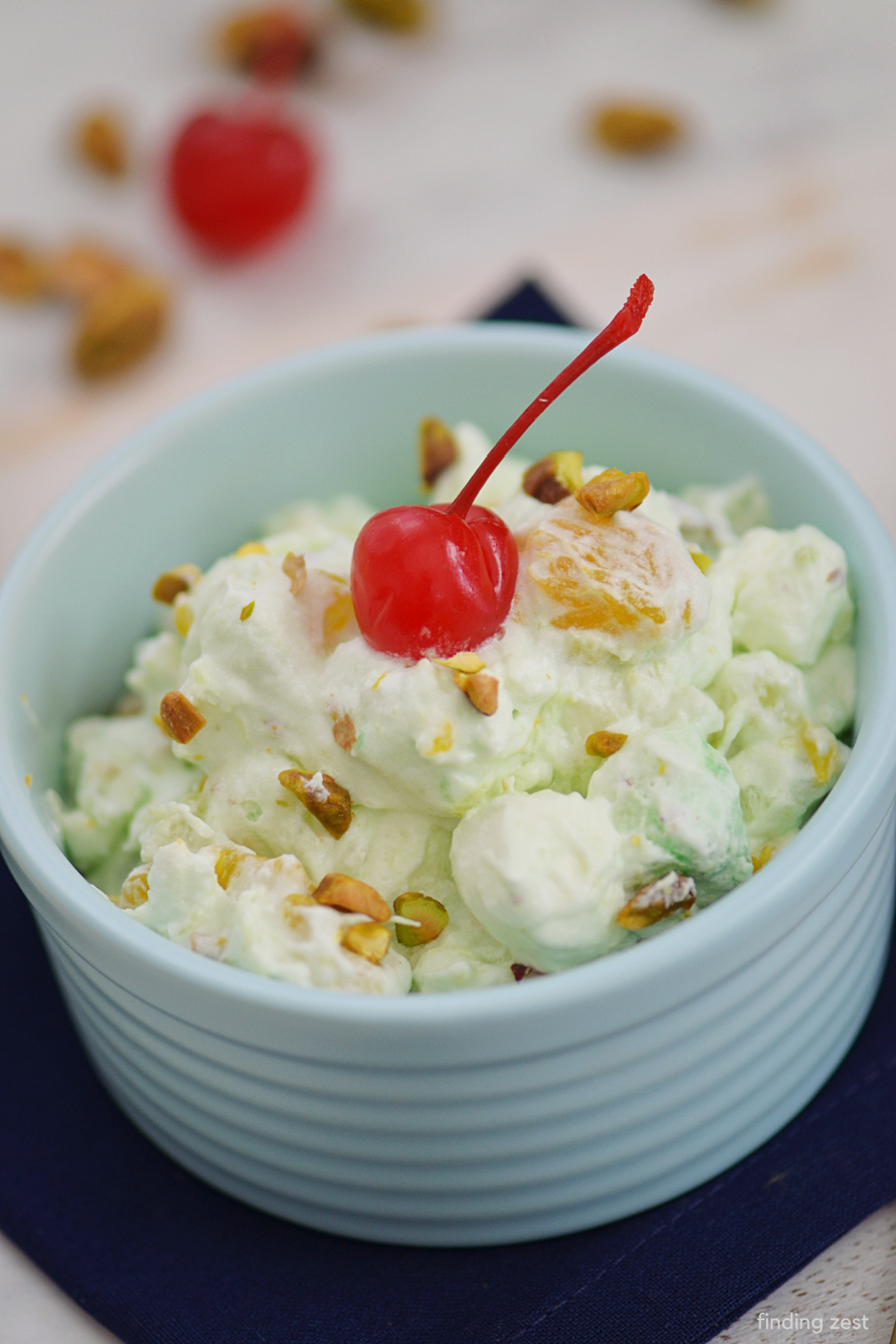 This easy pistachio fluff fruit salad is always a hit at potlucks, cookouts and holiday dinners! It is a great addition to any gathering year round!
