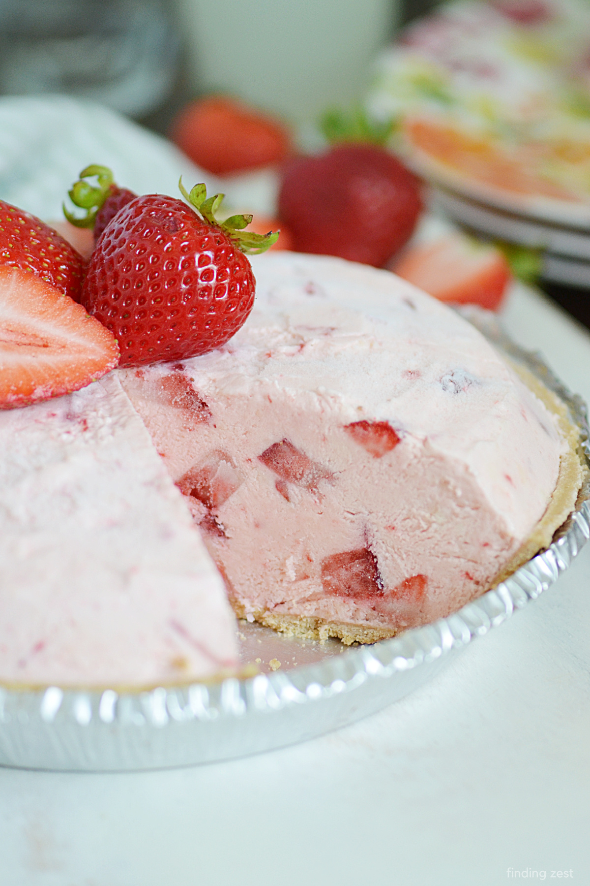 Frozen strawberry pie never looked so good! This easy spring or summer pie recipe is a great way to cool down on a warm day. Simple to make, it is always a hit at any summer gathering or holiday party! Try it at your next 4th of July, Labor Day or Memorial celebration.