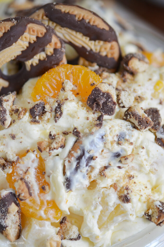 Cookie Salad is a favorite Midwest recipe! Featuring Fudge Stripe Cookies, mandarin oranges, pineapple, pudding and cool whip, it is a classic recipe that is always a crowd favorite!