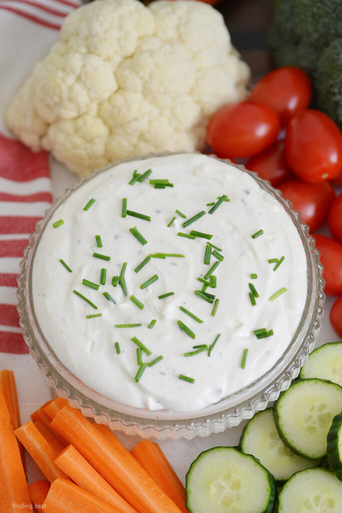 If you're in need of a easy dip, this four-ingredient ranch veggie dip is the answer. With just a few basic ingredients—sour cream, cream cheese, mayo, and ranch seasoning—you'll have a creamy, favorable dip ready in no time. It's an effortless way to elevate any veggie platter!