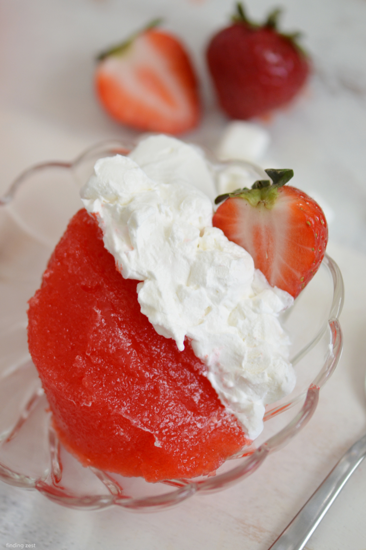 This strawberry jello salad with applesauce is a delicious side dish or light dessert for your next potluck, cookout or holiday gathering!