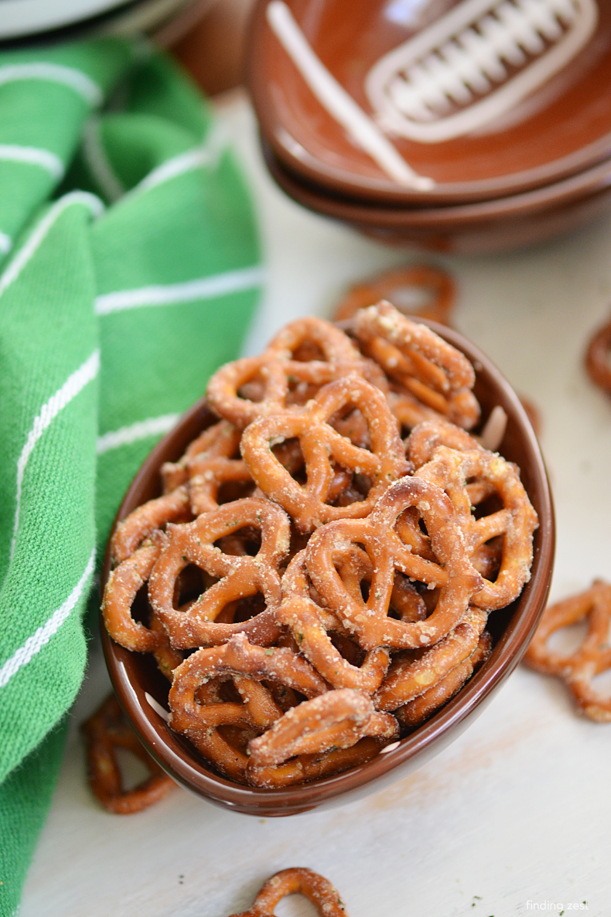 Need some football party food? A Super Bowl snack? Maybe just a little fan fuel while tailgating or watching a rivalry game? Whatever the reason, these Ranch Pretzels are a super easy recipe. Seasoning with ranch dressing, dill and garlic then baked to perfection! 